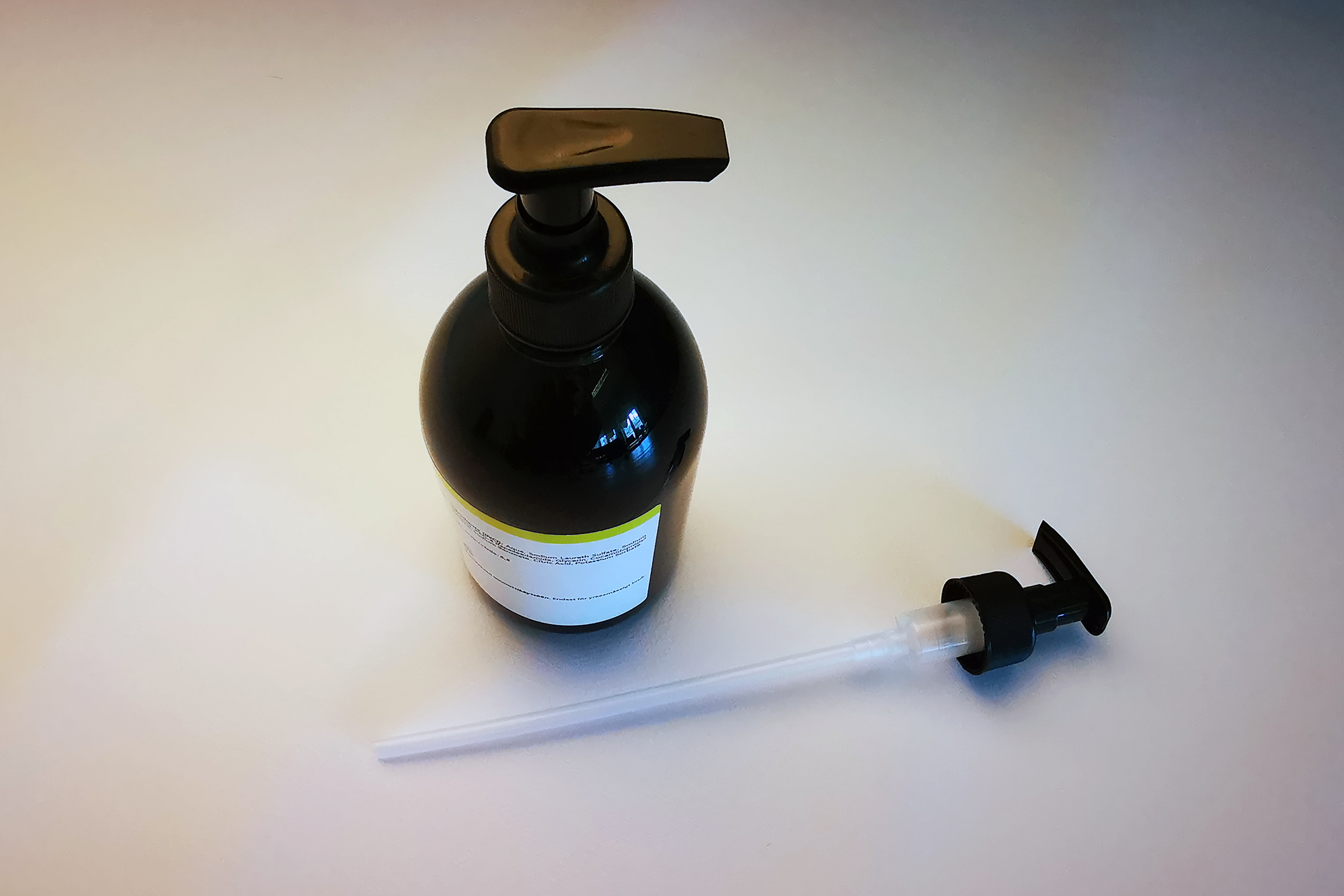 Lotion Pump SLIM 28/410 color black on black PET bottle 500ml